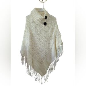 EUC! Ivory Knit Poncho with Silver sequin detail. Fits up to Size L.